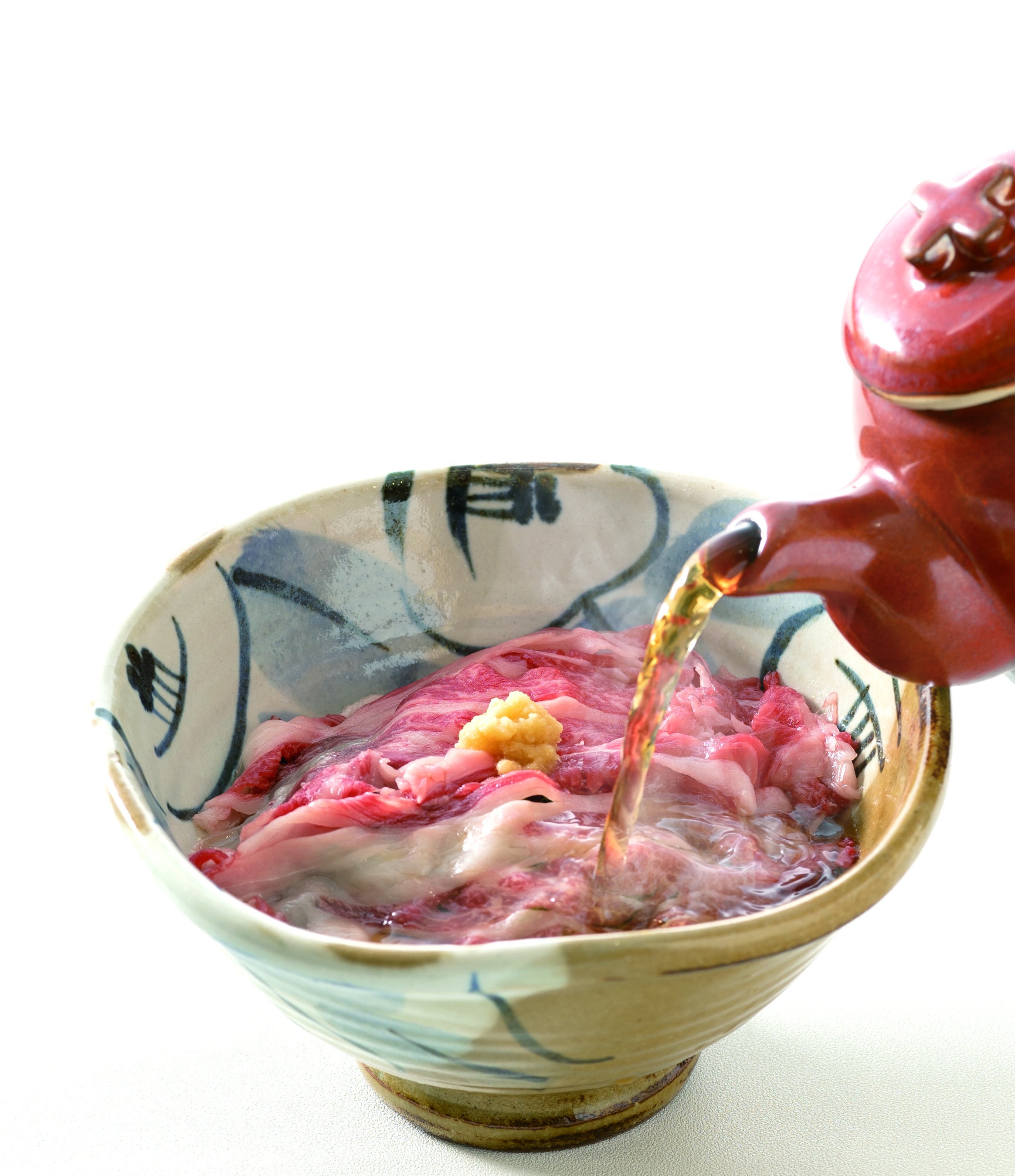 専用の調味だし汁をたっぷり注いでお召し上がりください。