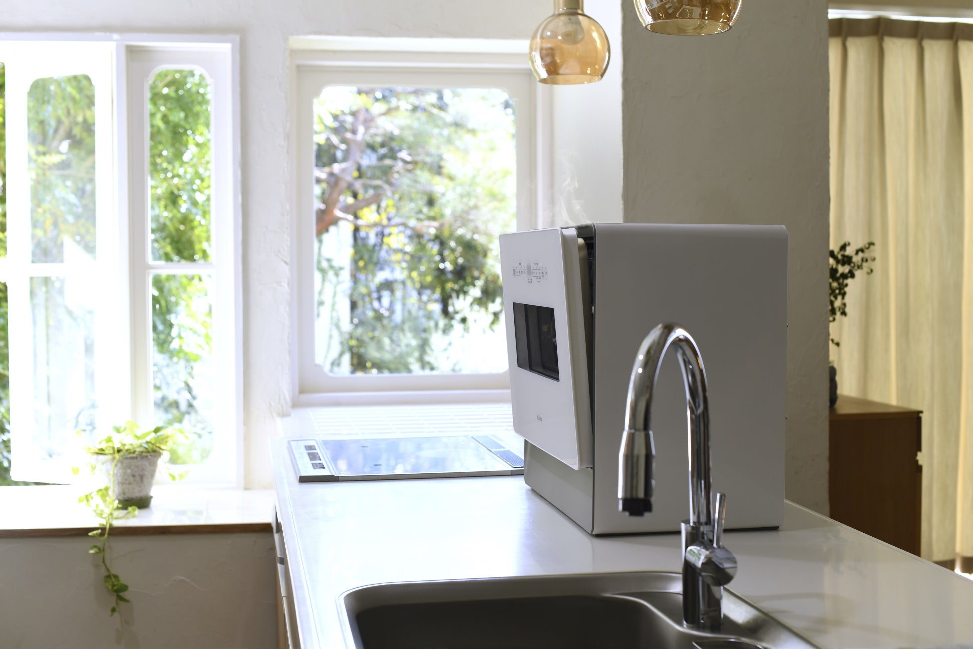 オートオープン機能により蒸気を逃がしている様子