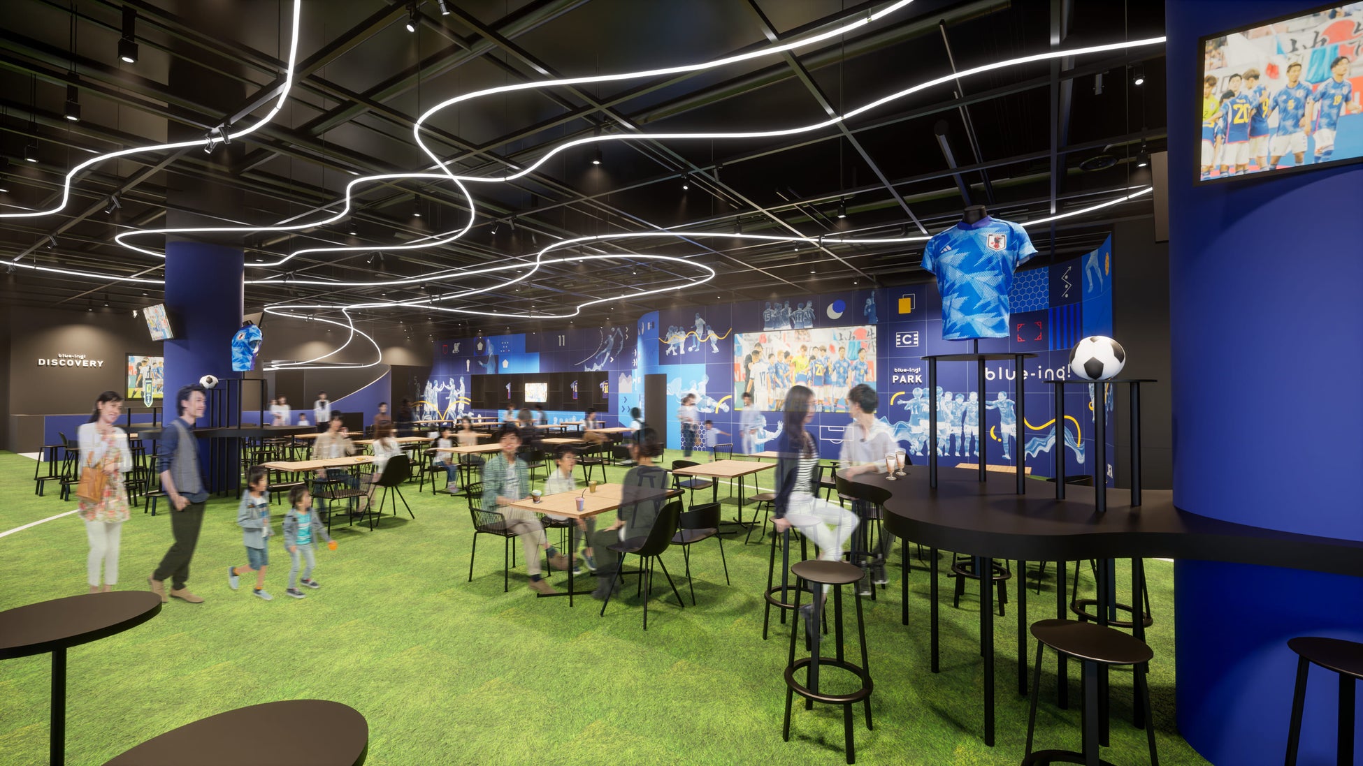 公園感のある大型ビジョンを備えた芝生エリア