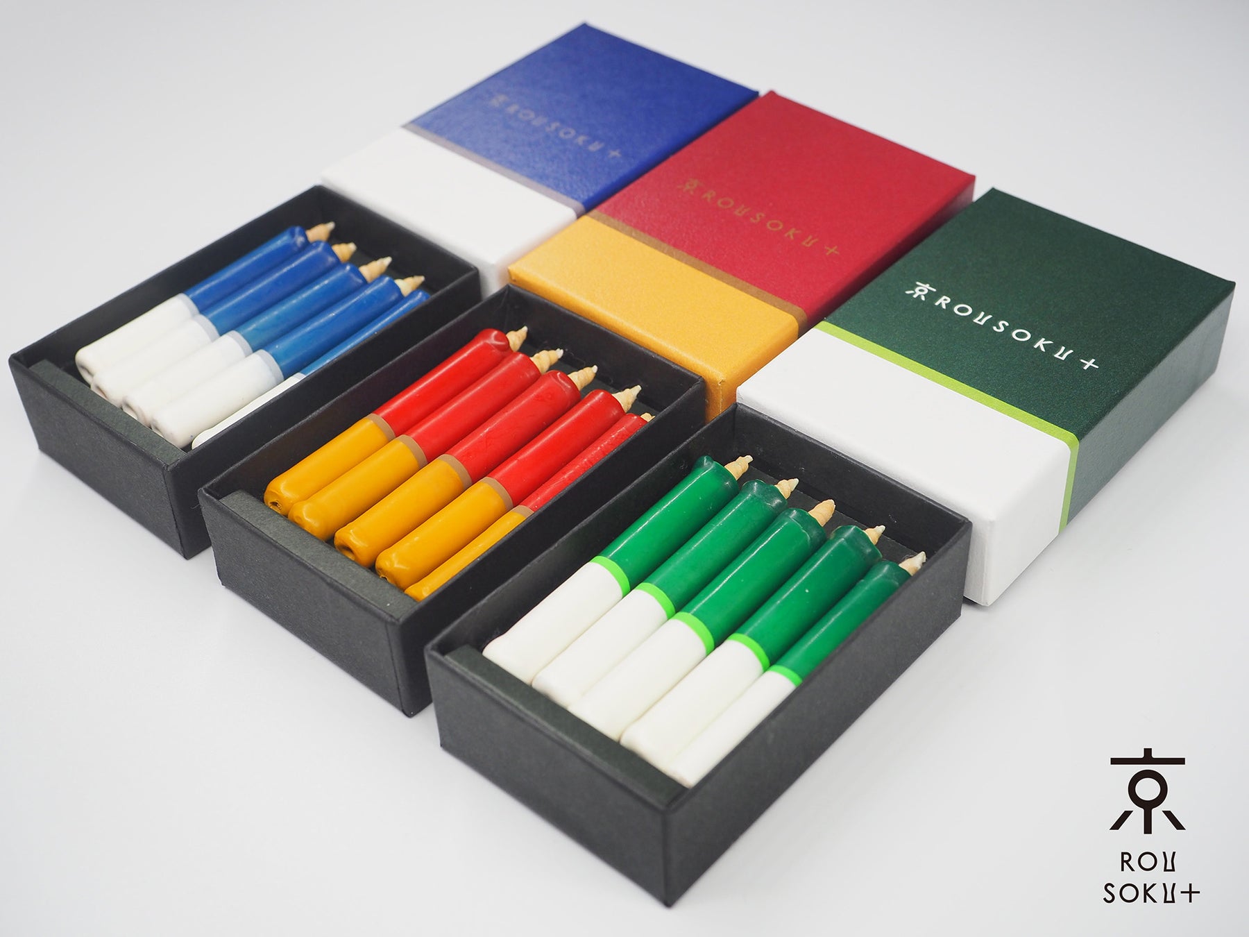 京阪電車の3000系、8000系、普通車両の車体カラーをイメージした和ろうそく