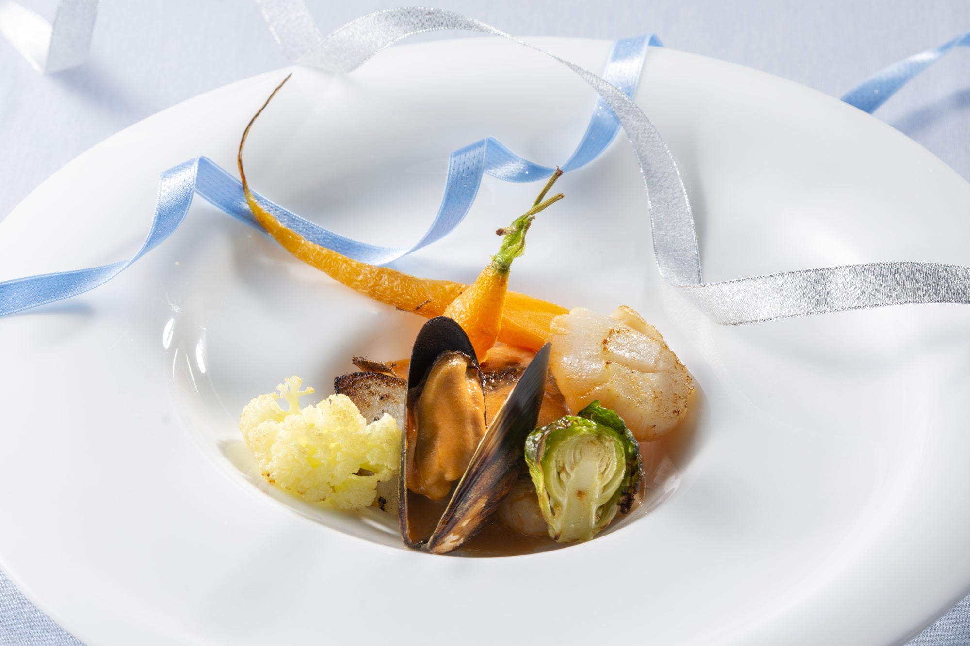 【1月魚料理】魚介のフリカッセ　ジュ・ド・オマールの香り