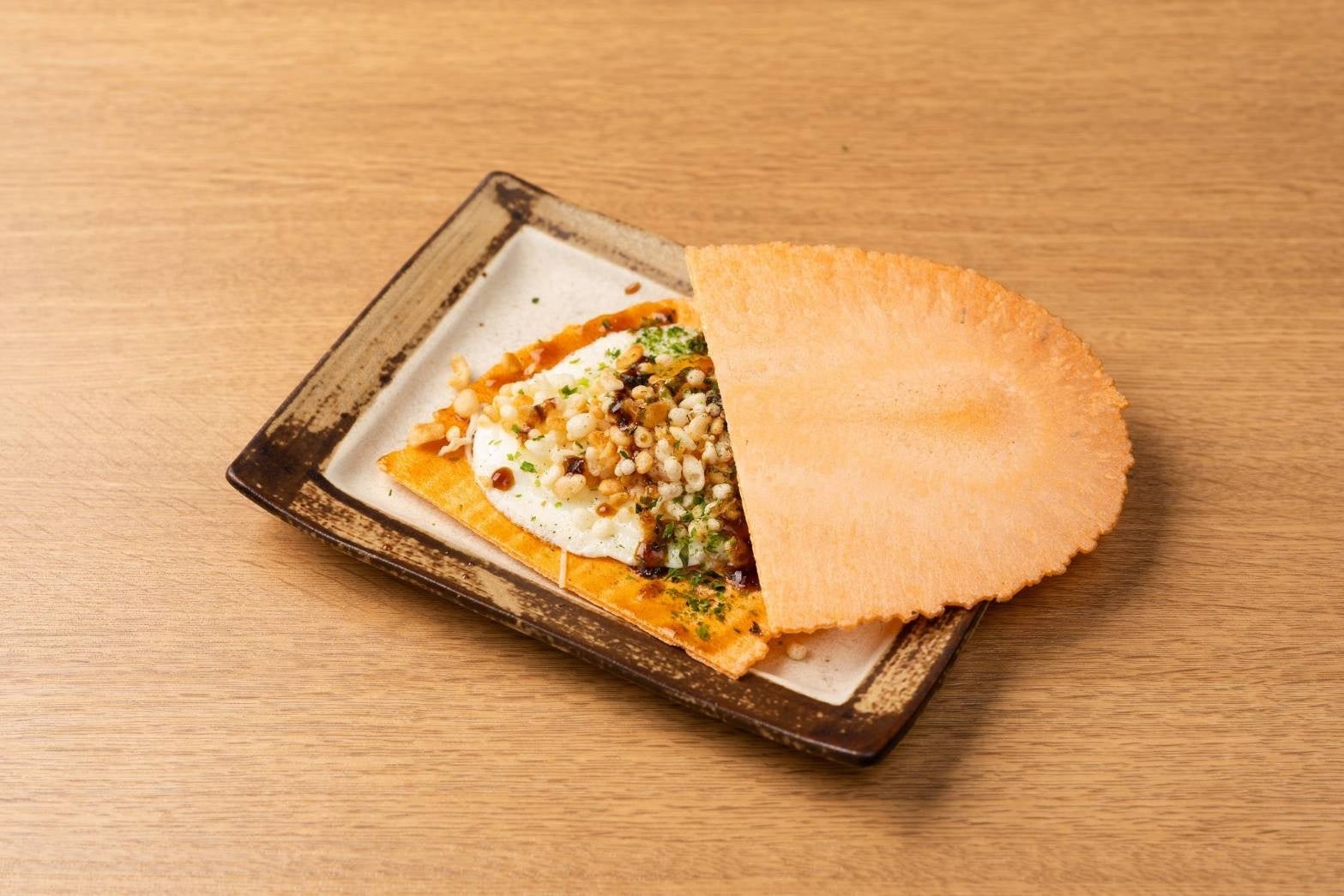 ▲お好み たまちゃん／13階／「たまちゃん名物！たません（たまちゃんせんべい）」