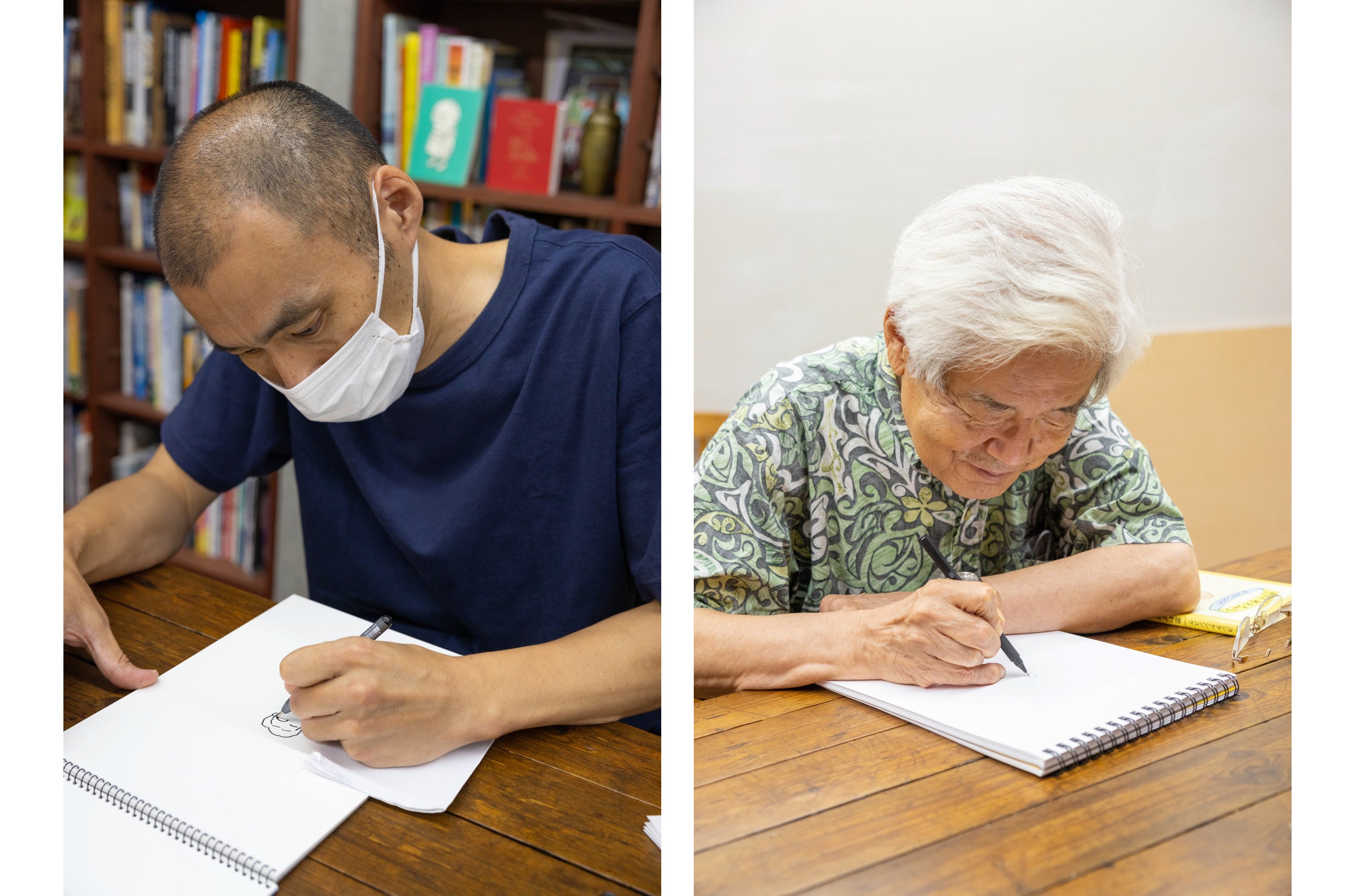 ヨシタケシンスケさんの新しいアトリエでお互いの似顔絵を描きあうふたり。完成した絵は、本邦初公開となるアトリエの写真と共に誌面に掲載しています。撮影：青木登（芸術新潮）