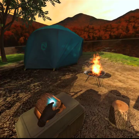 薪にタッチして焚火を燃やす