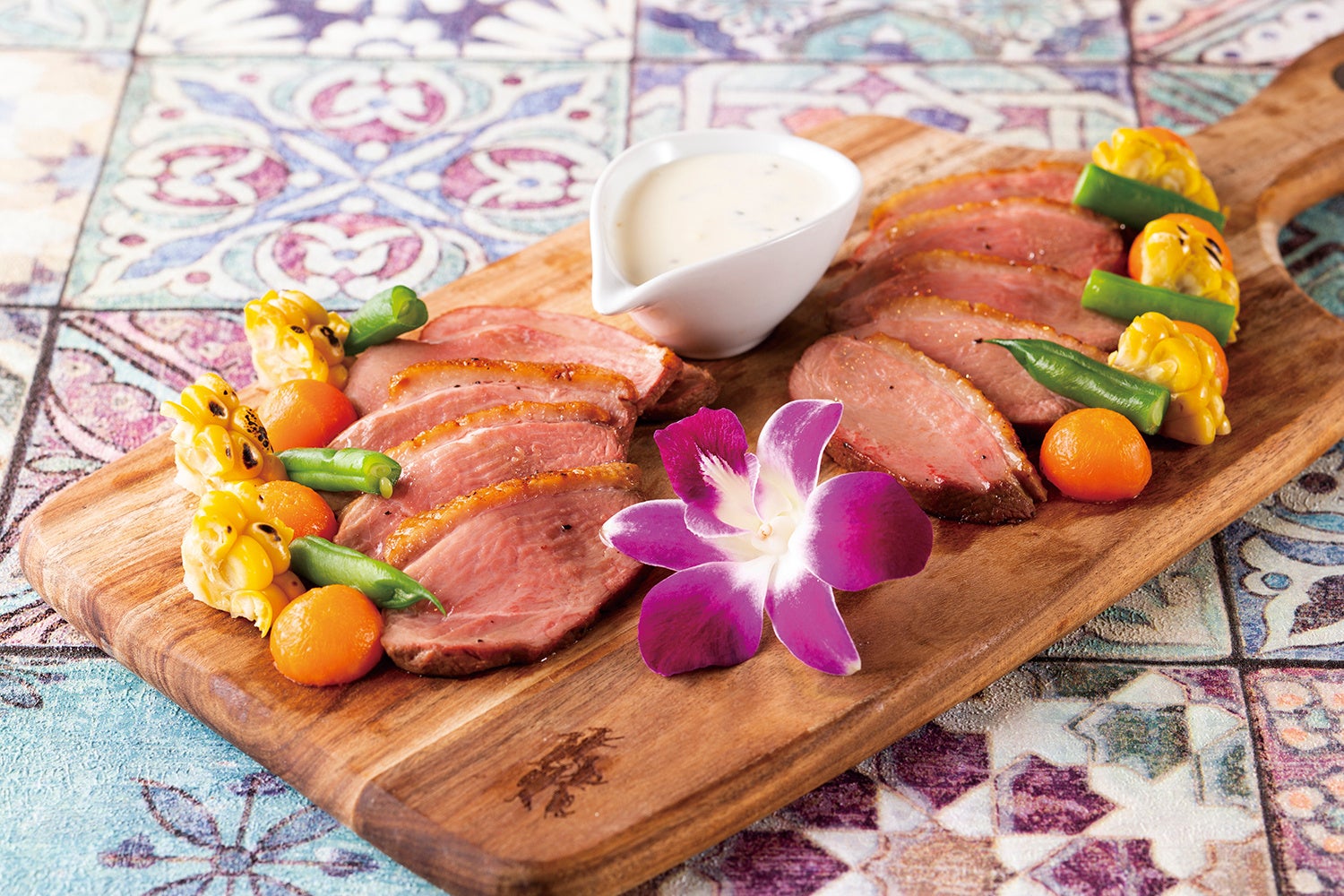 合鴨胸肉のロティ　グリーンペッパークリームソース