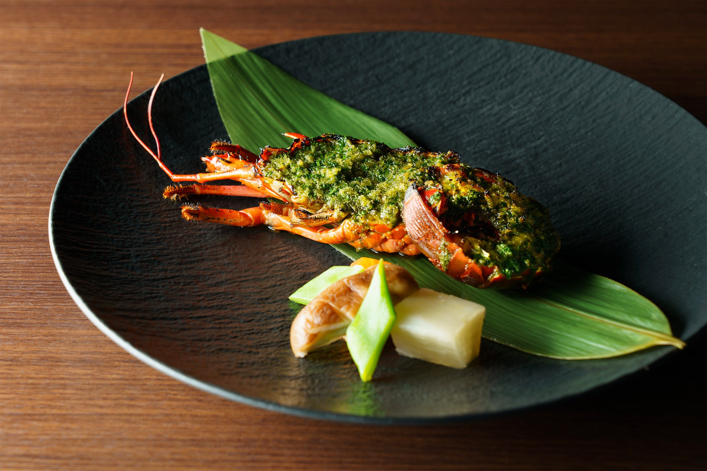 下田産伊勢海老の香草バター焼き　野菜の炊き合わせを添えて