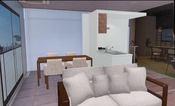 VRモデルルーム上にMRを用いて3D家具を投影した様子