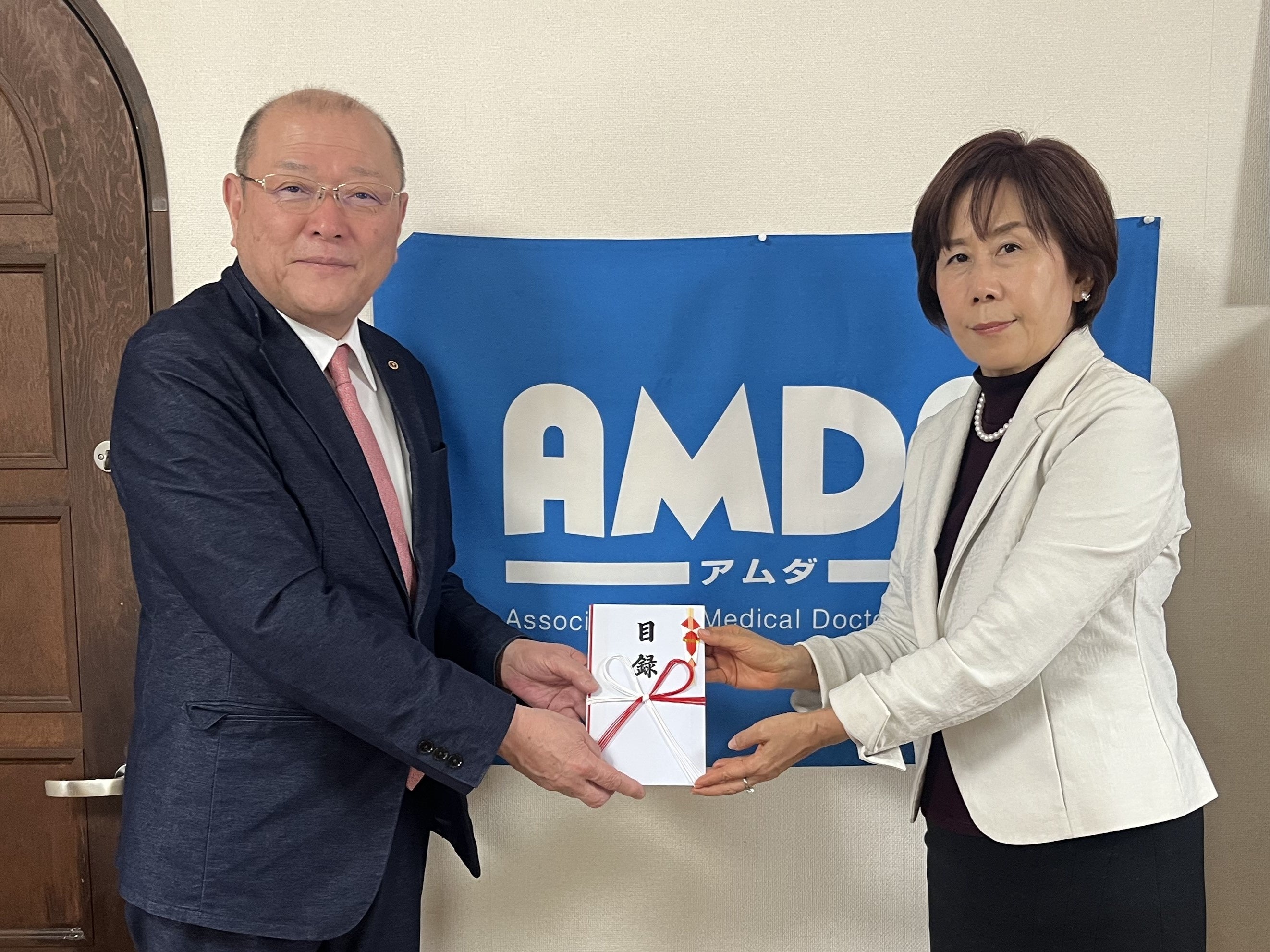 HD松田（左）、AMDA難波副理事長（右）