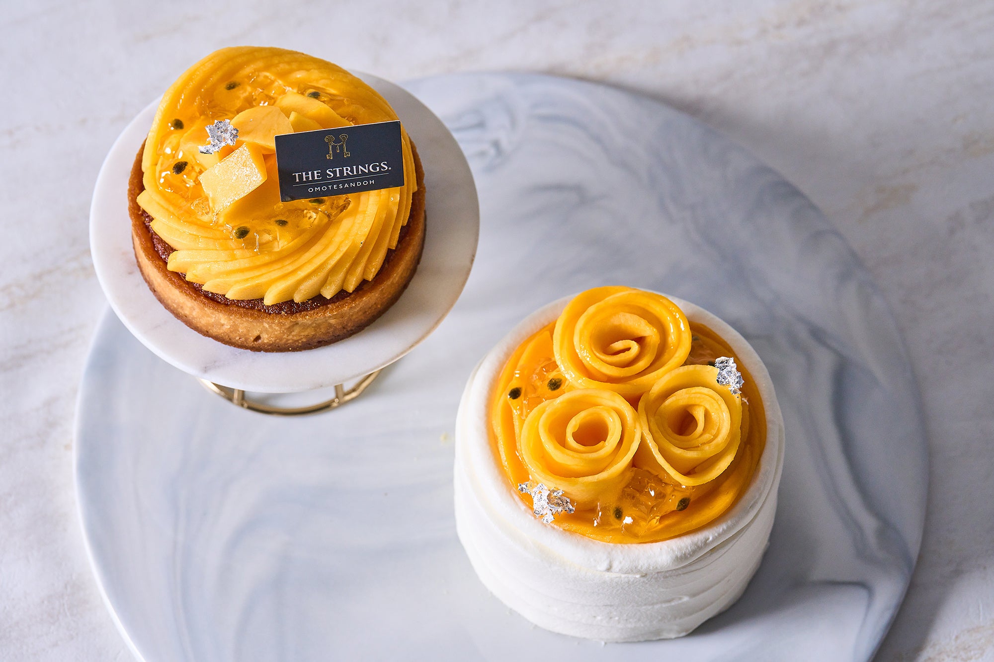 沖縄県産の完熟マンゴーを贅沢に使用した華やかなケーキ2種