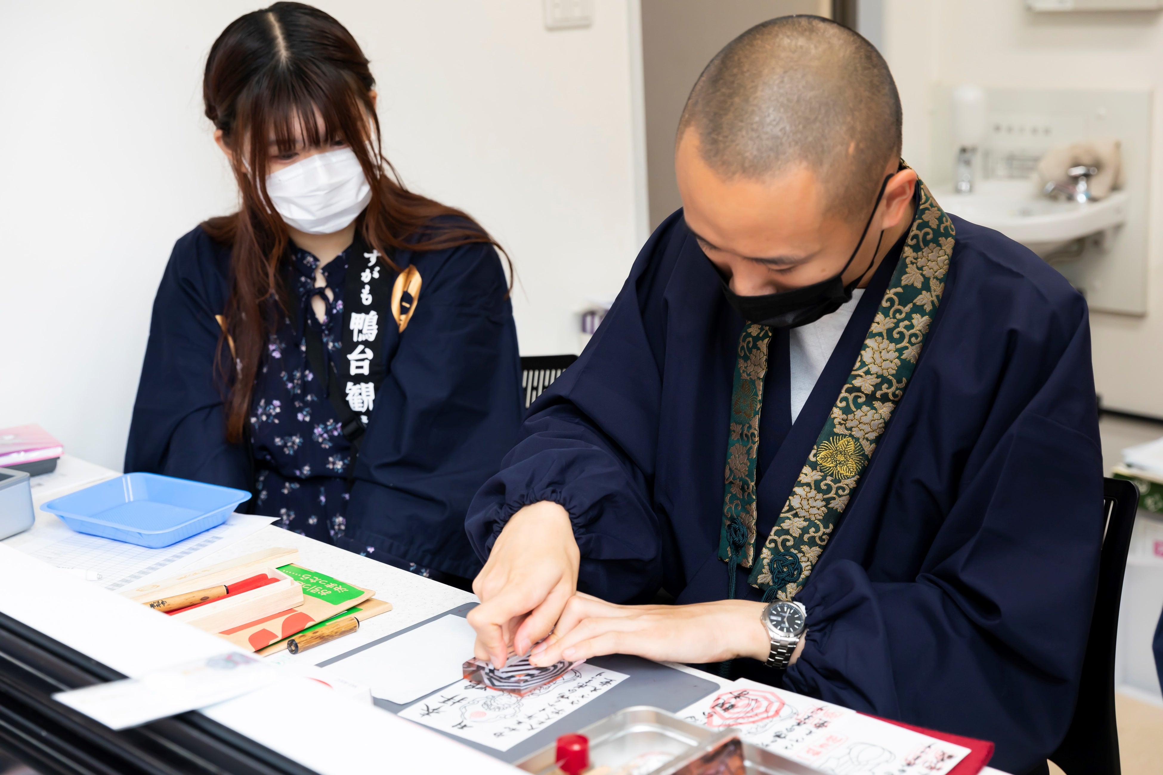 2023年に開催した「第10回すがも鴨台花まつり」の学生による御朱印浄書