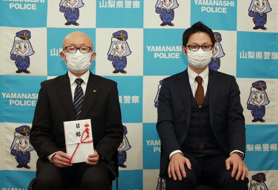 左：山梨県警察本部 交通部長 警視正 窪田 豊氏、右：ナイル株式会社 執行役員 社長補佐 大谷 昌史