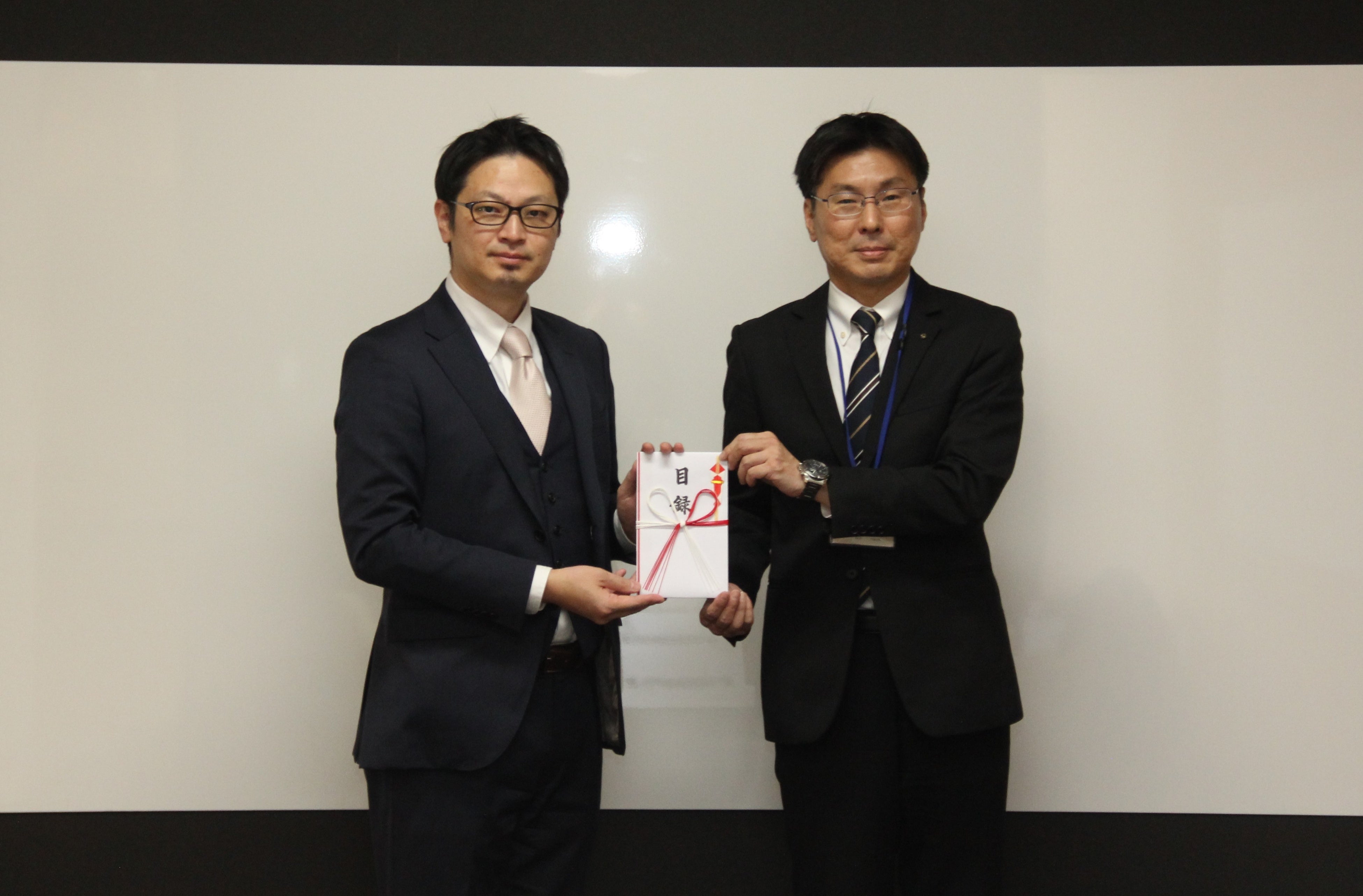 左：ナイル株式会社 執行役員 社長補佐 大谷 昌史、右：福島県 生活環境部生活交通課 課長 佐藤 司氏