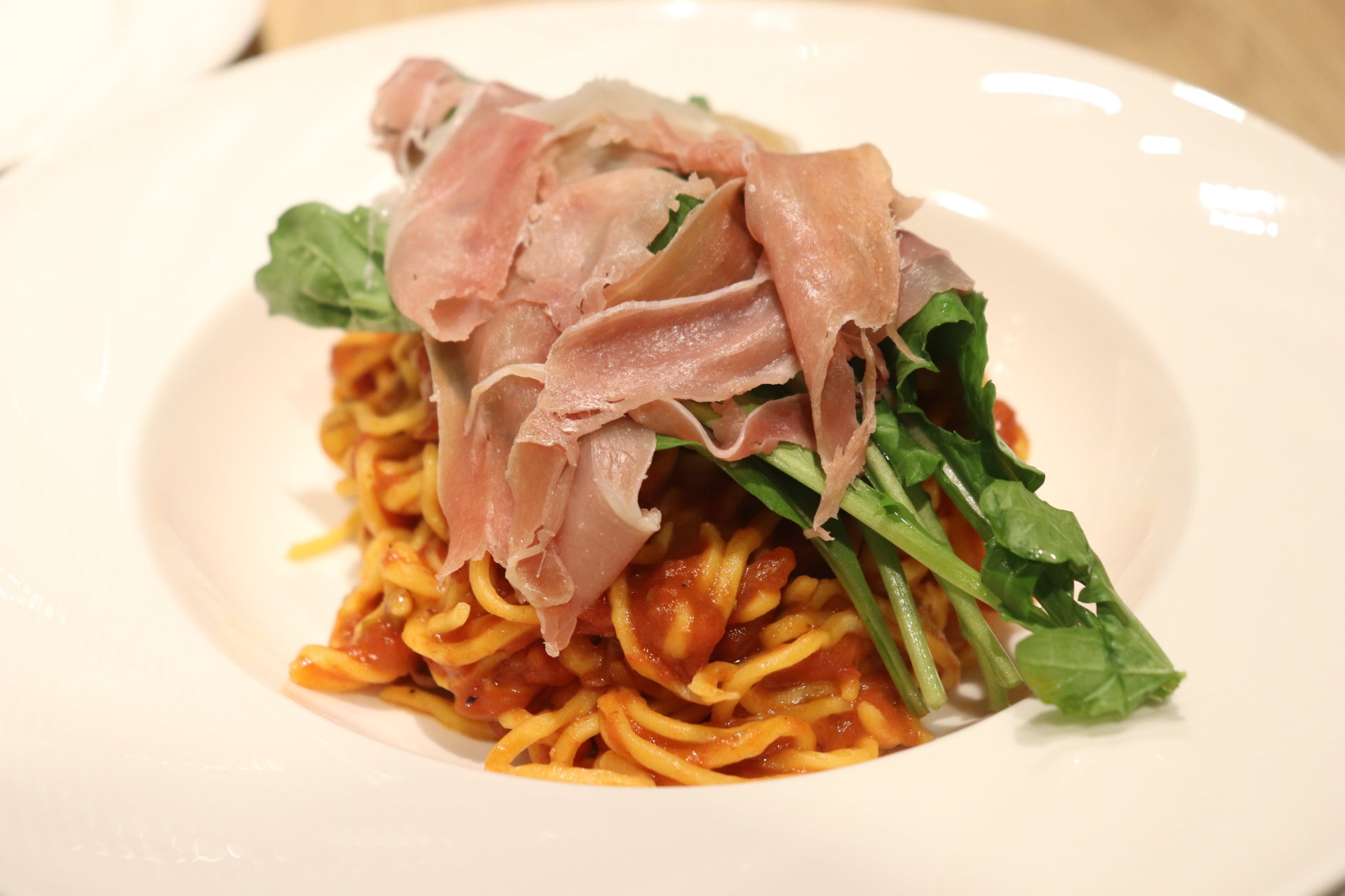 手打ちタリオリーニのプッタネスカソース