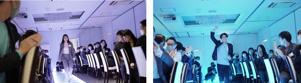 受賞社員はライトアップされたランウェイを歩く