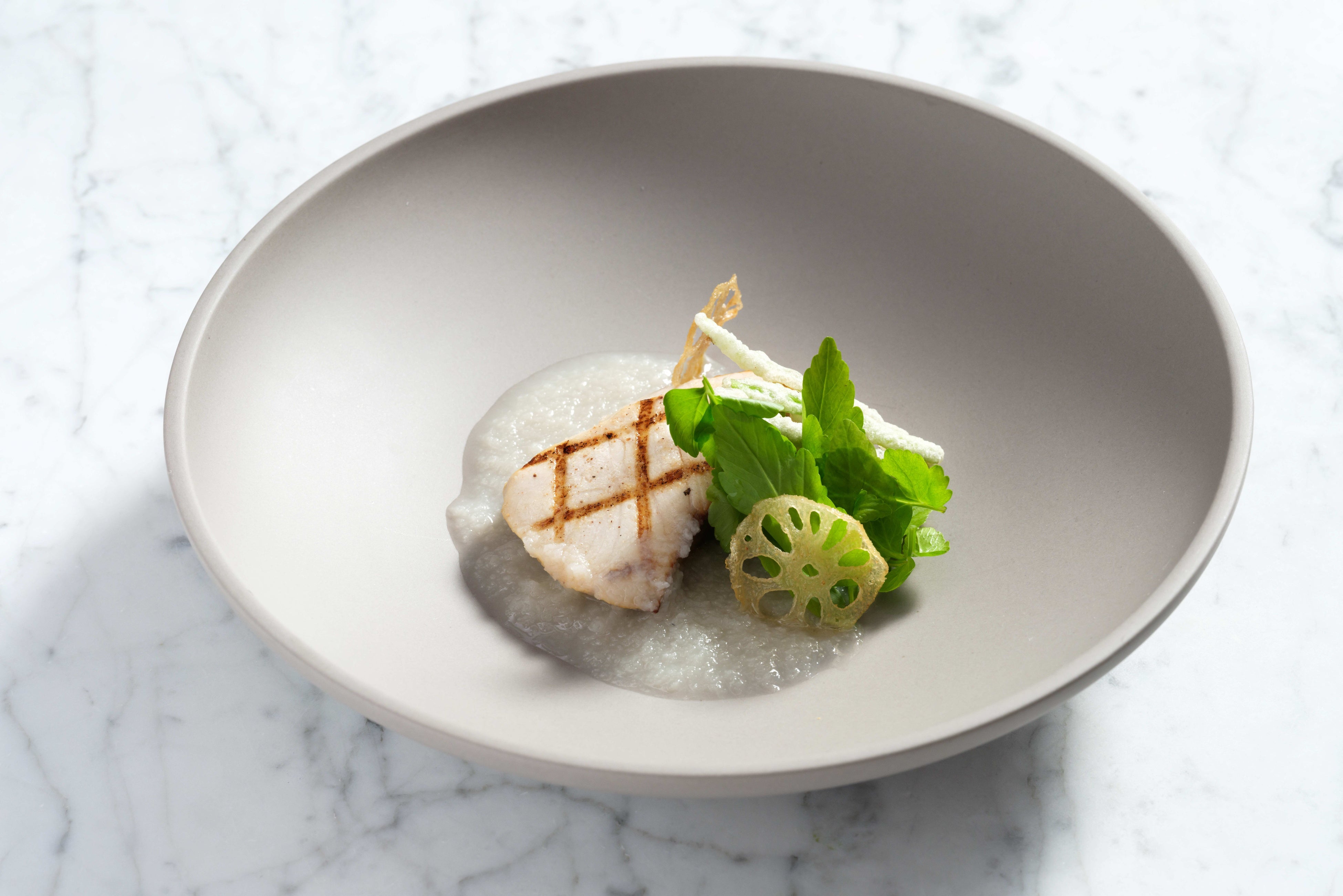 塩糀でマリネした金沢港産ブリのグリル  加賀れんこんのガレットとすり流し  金沢せり