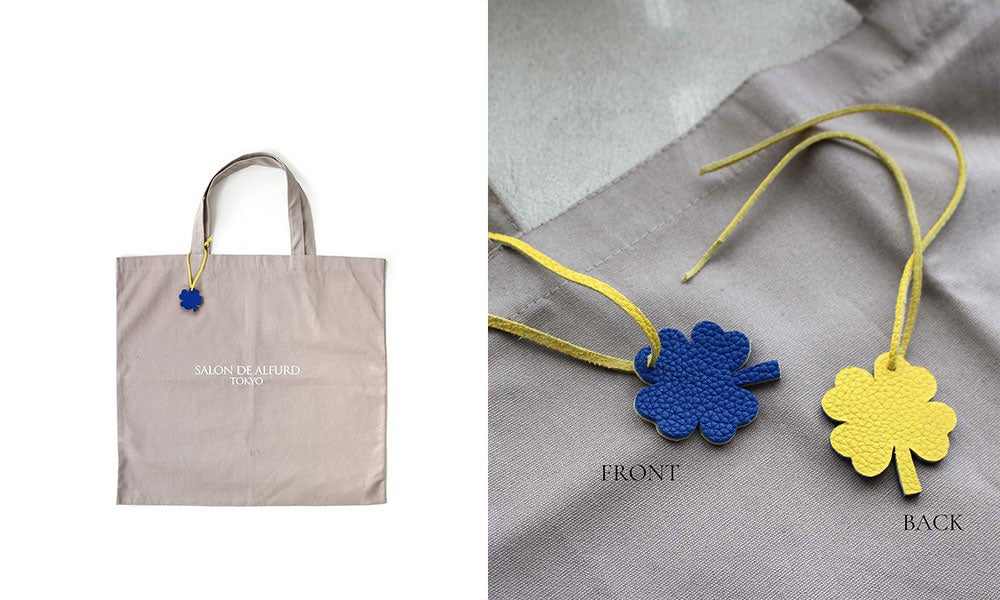 ハートチャームの廃材からできた みなさまの「気持ちを繋ぐ」クローバーチャーム付きエコバッグ