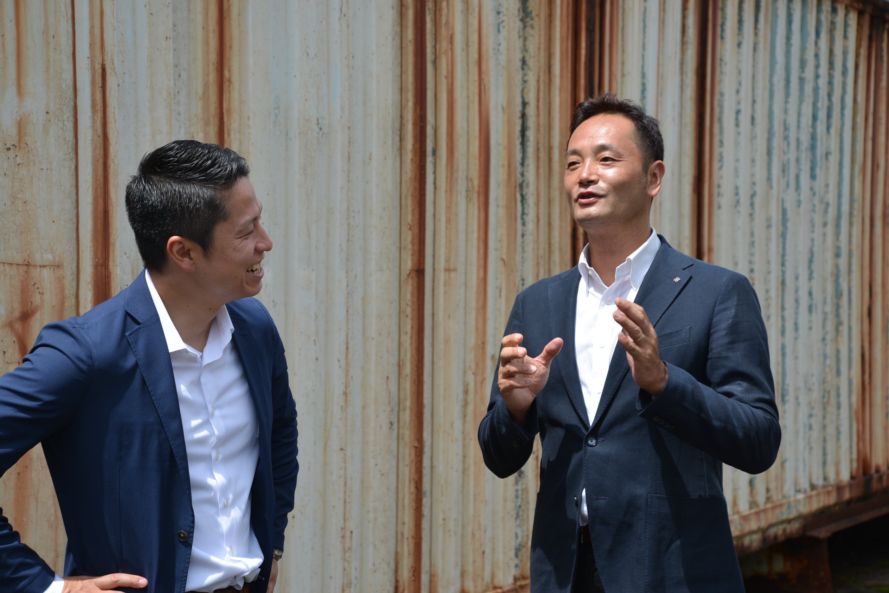 研究開発拠点の構想について石田社長に語る弊社中村