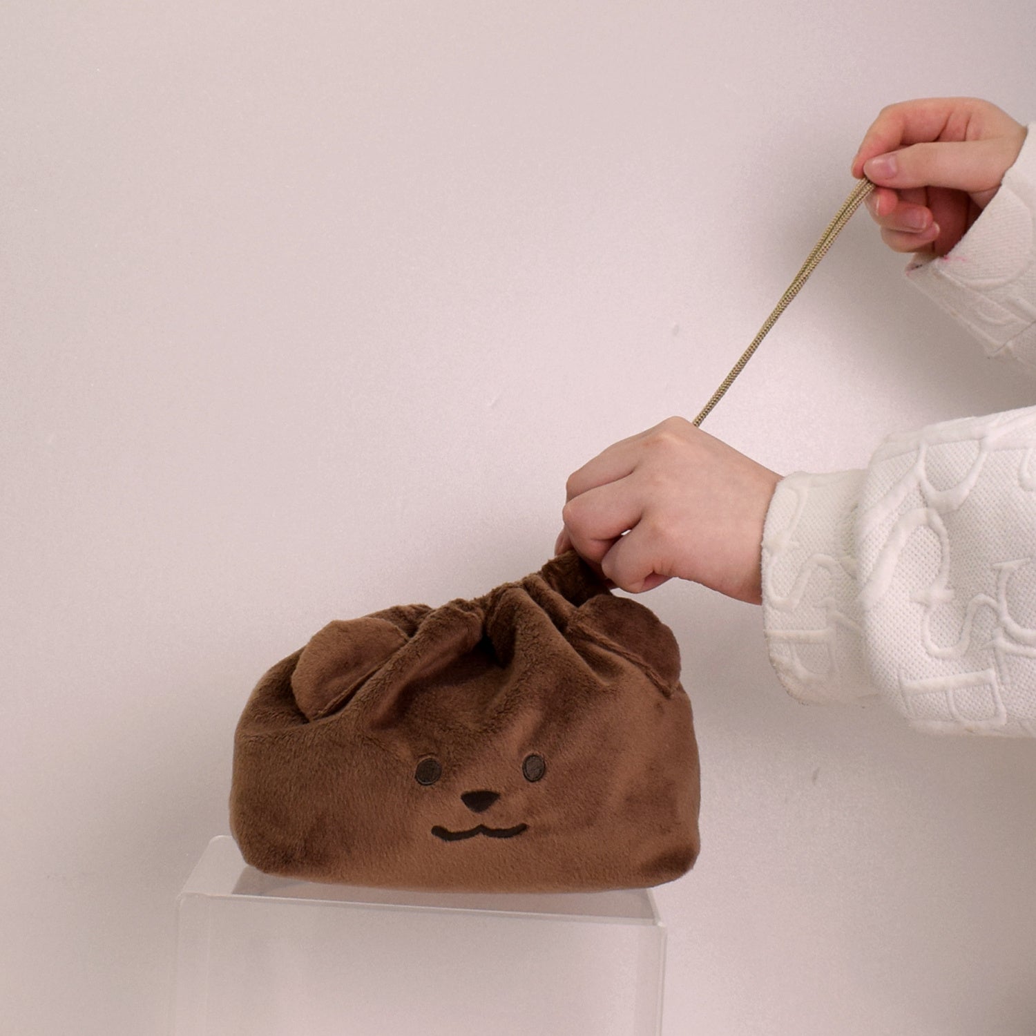 ワンアクションで絞れる片引き巾着タイプ