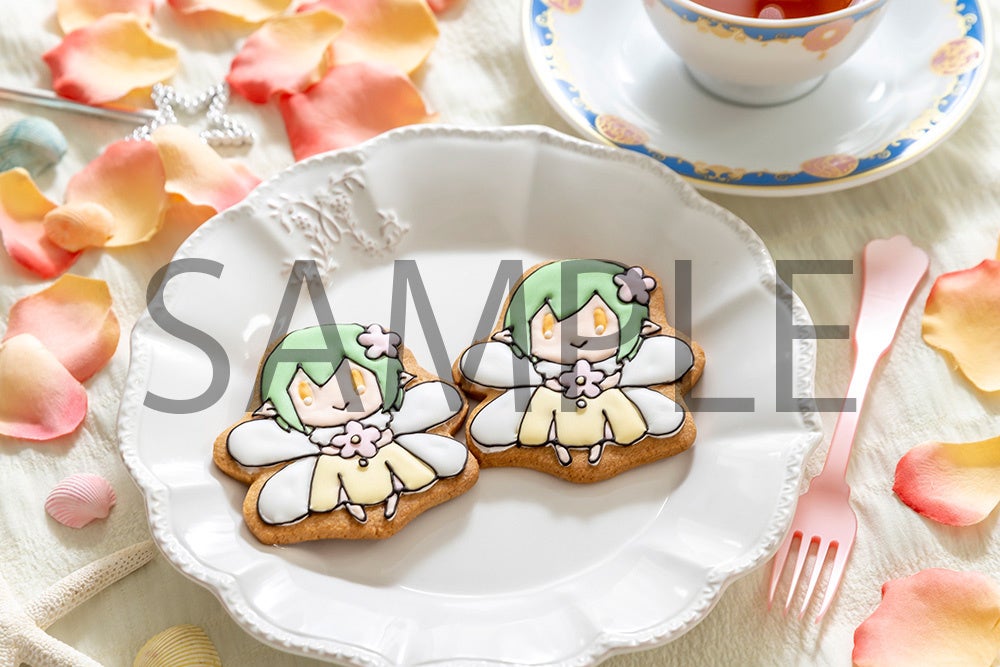 コミックス9巻の発売時にお祝いクッキーを製作いただいたメリリルさんご協力のもと、ティアラローズお手製のクッキーをイメージしたクッキーセット。 アイシングで表現したほしな先生描き下ろしの森の妖精さんクッキーが1つと5種のクッキーが入っています。