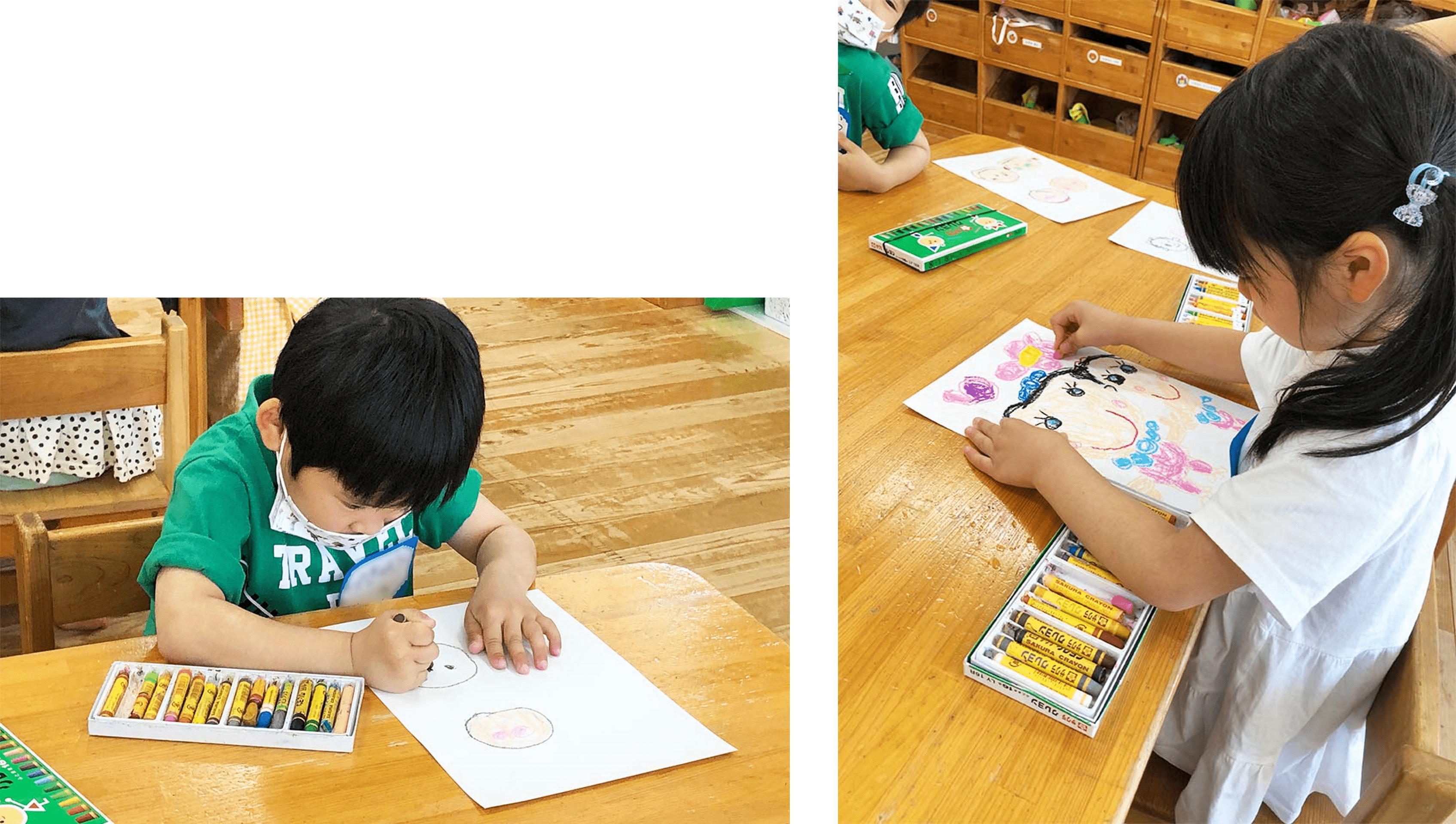 真剣な表情で似顔絵を描く子どもたち