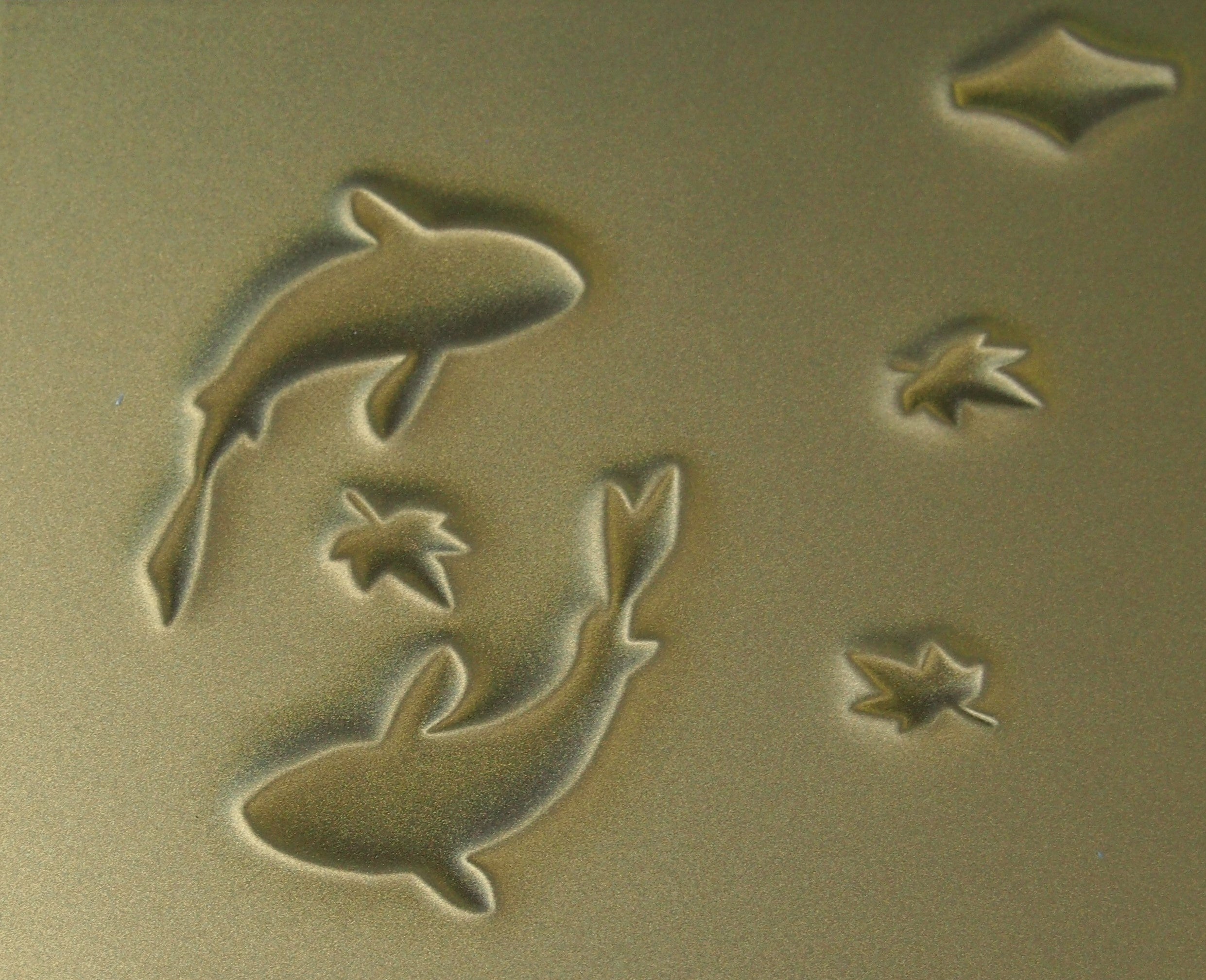 磁性アルミニウム顔料　（磁性を利用して模様を立体的に浮かび上がらせた塗装例）