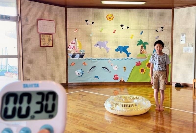 緊張した表情でスタートを待つ佐藤さん