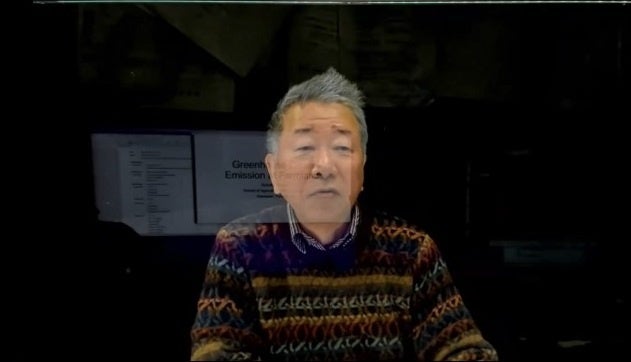 講演を行う明治大学の登尾浩助教授