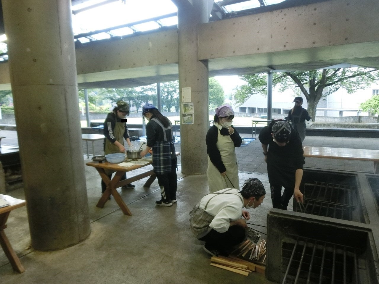 おこした火をつないで、みんなで調理