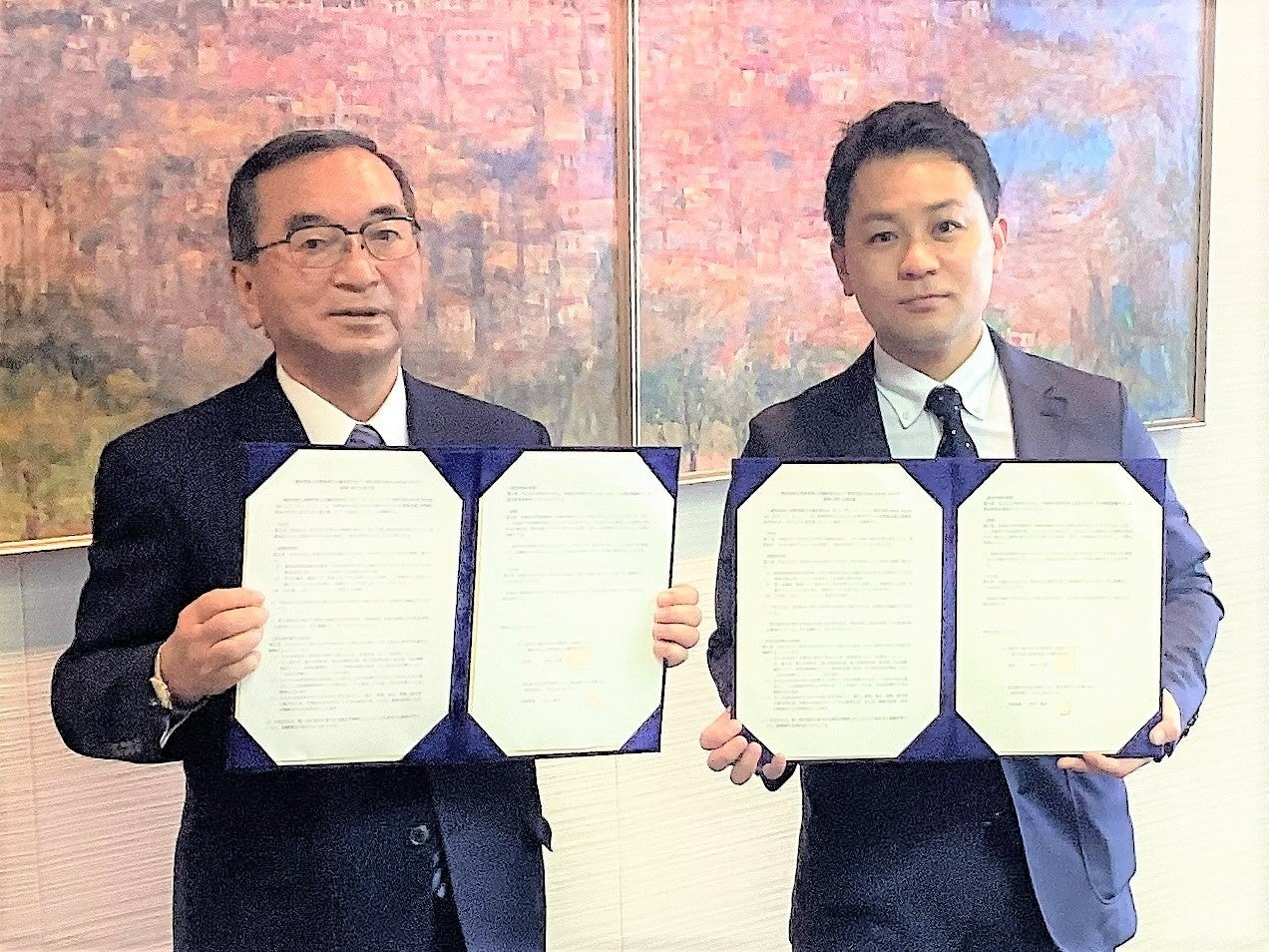 （写真左）一般社団法人長野県商工会議所連合会 会長 北村正博、（写真右）一般社団法人WorkDesignLab 代表理事 石川 貴志