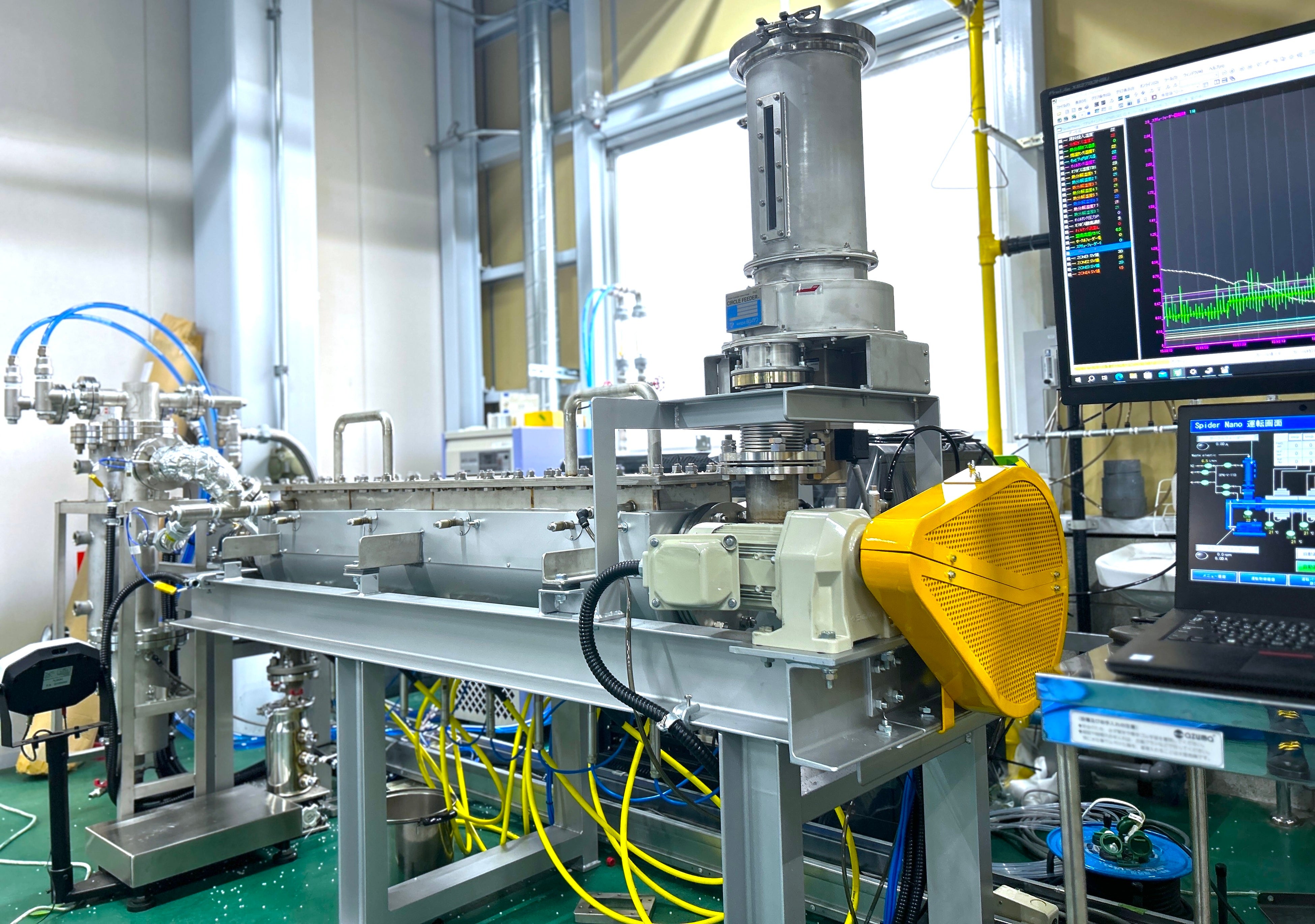 マイクロ波を用いたケミカルリサイクルの連続式実証機