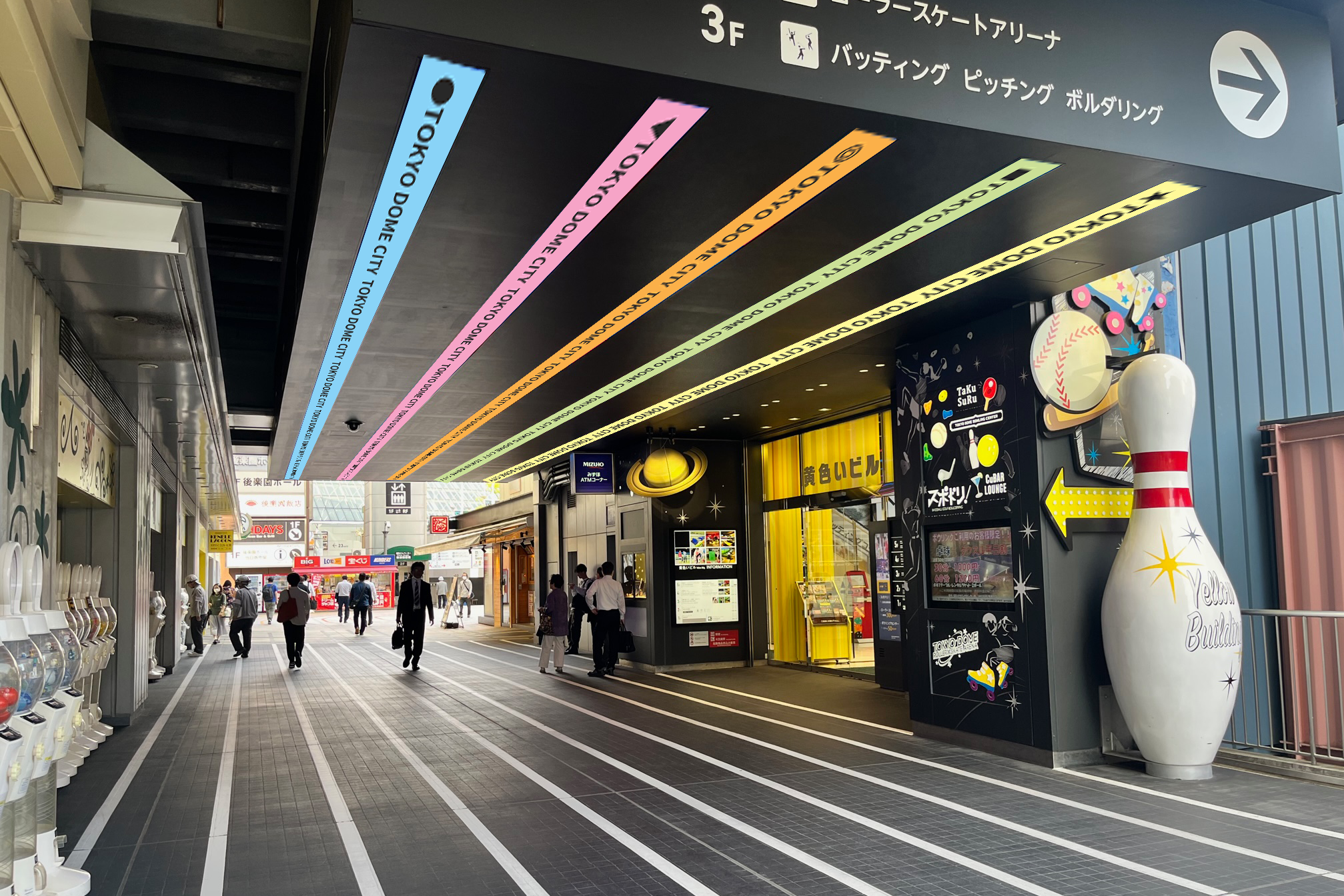 ＜黄色いビル天井リボンビジョン＞