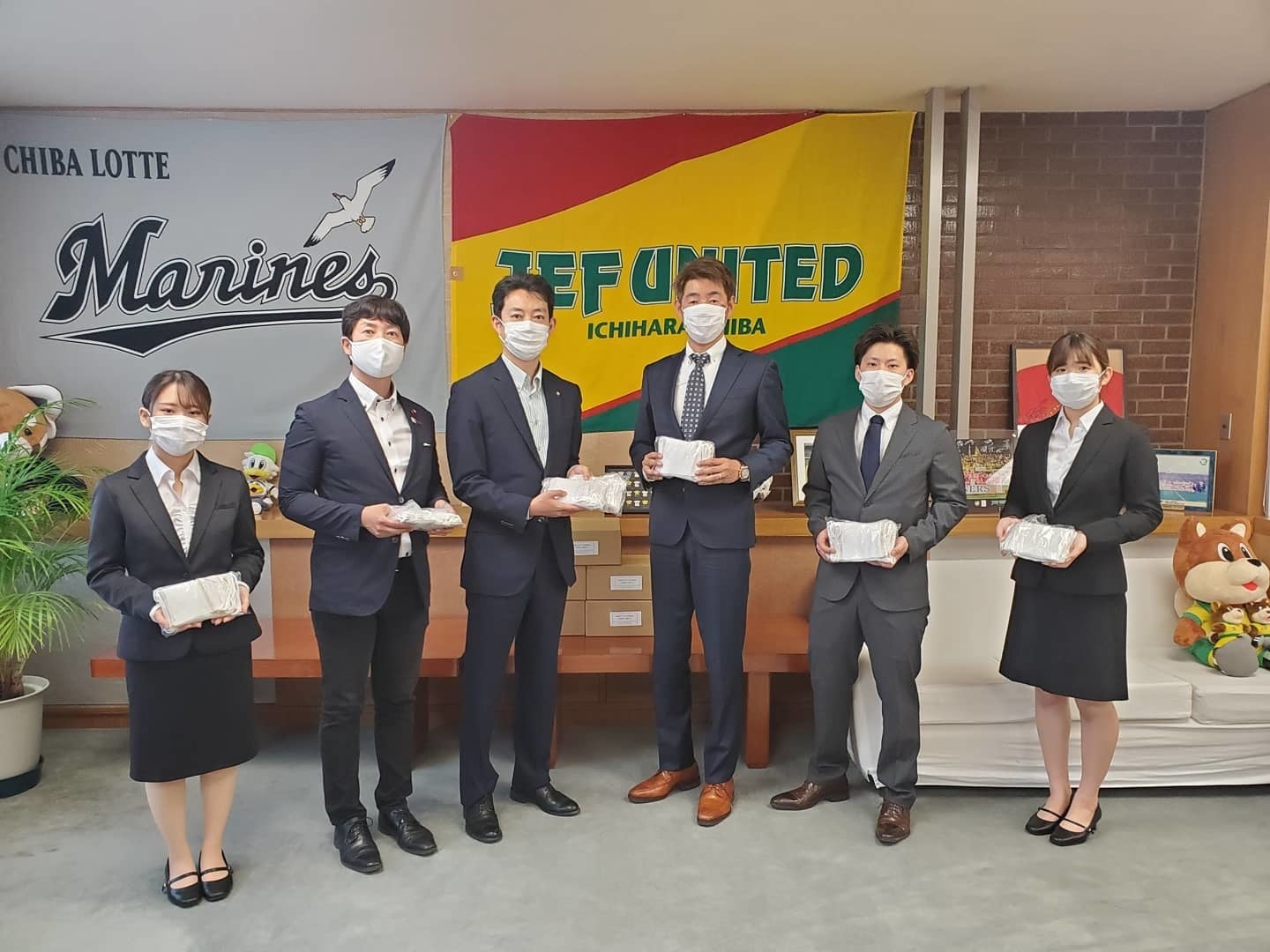 中央左「熊谷市長」、中央右「代表：小西」／2019年