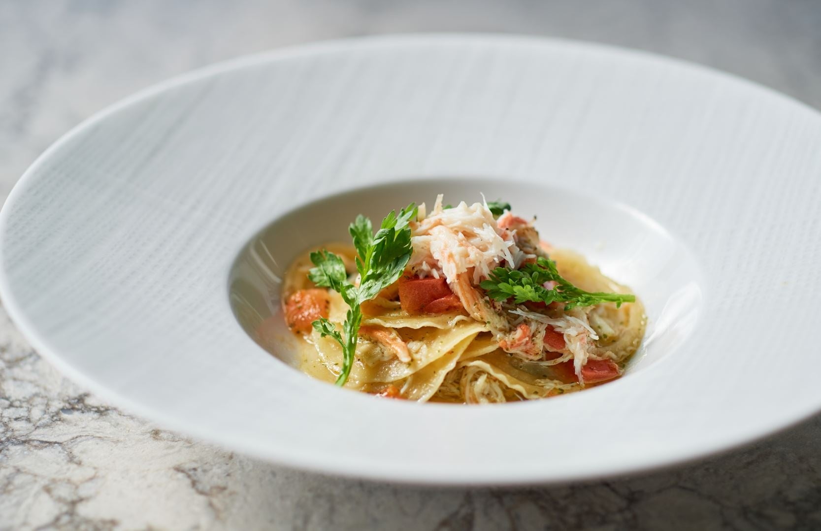 ズワイ蟹 バジル 春菊のコルツェッティ