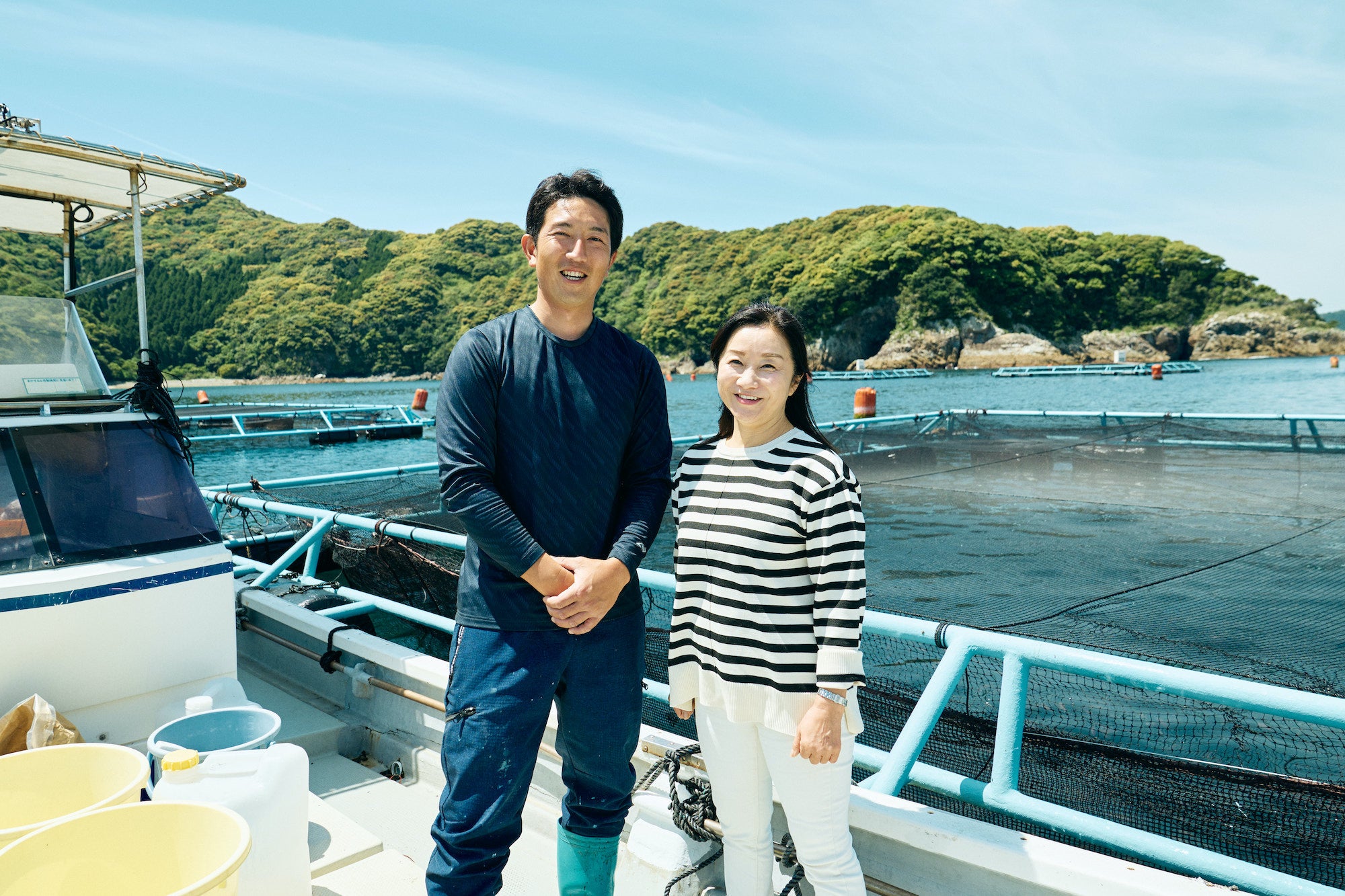 木下水産の専務・木下拓磨さんと弊社代表・築地加代子
