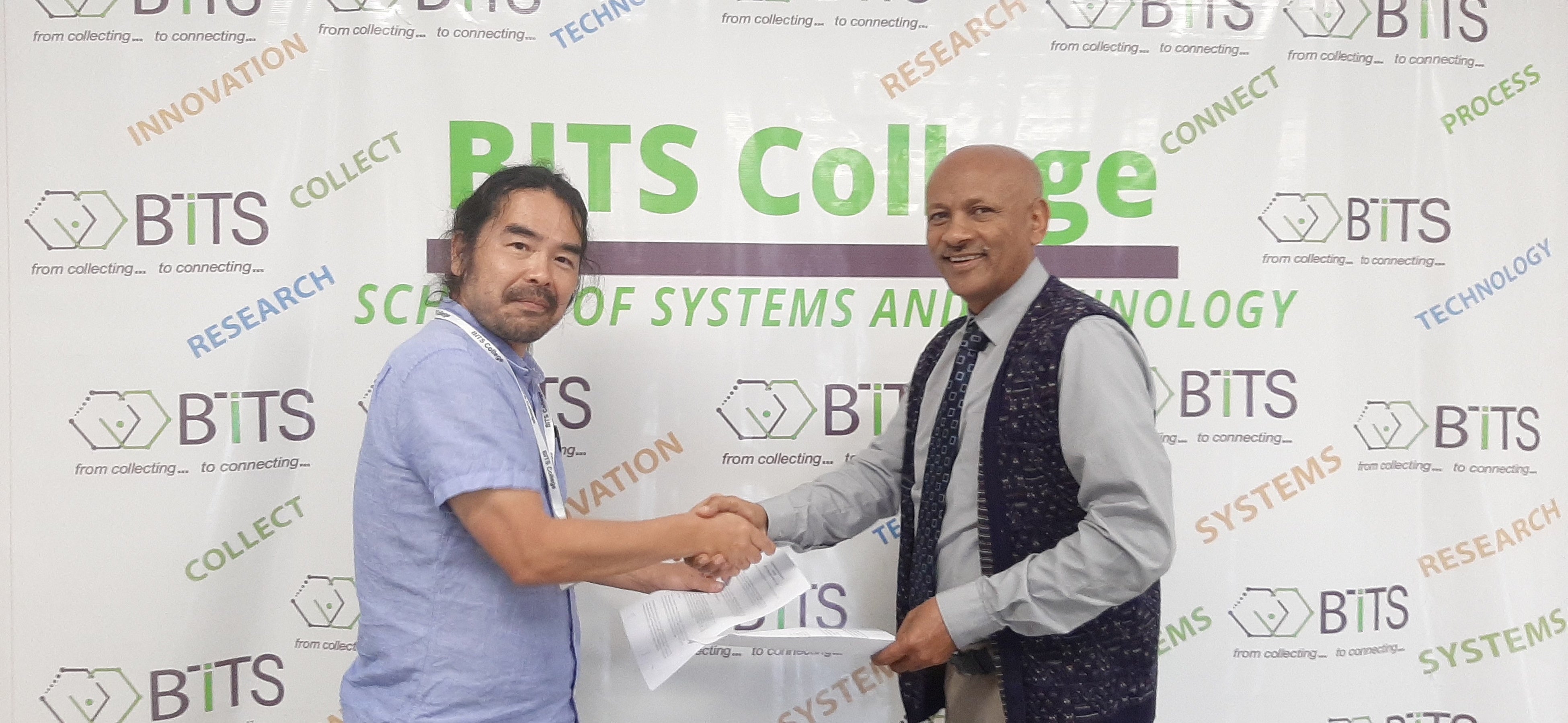 キャスタリア代表山脇とBITSカレッジのテスファイ・ビル学長