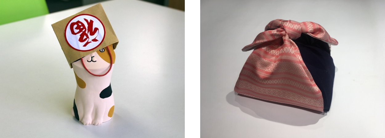 左）博多人形 福かぶり猫（福を招く福岡の招き猫）　　右）博多織 つつ美（風呂敷のようにつつめるポーチ）