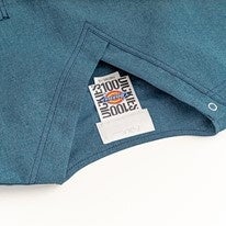 100周年限定ロゴタイプ入りのタグ