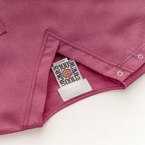 100周年限定ロゴタイプ入りのタグ