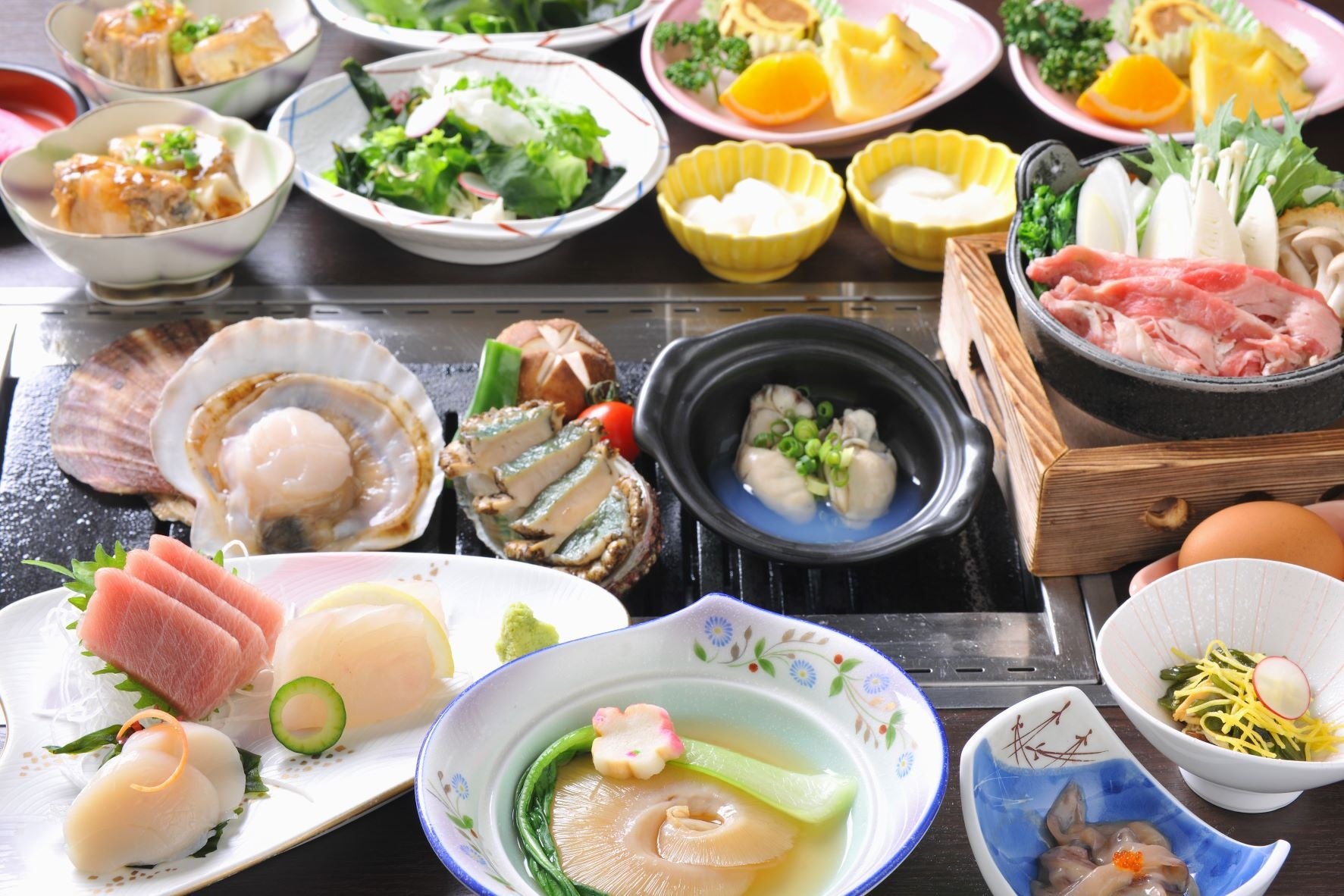 無煙ロー スターにのせて「浜焼きスタイル」でお楽しみいただける人気の会席コース