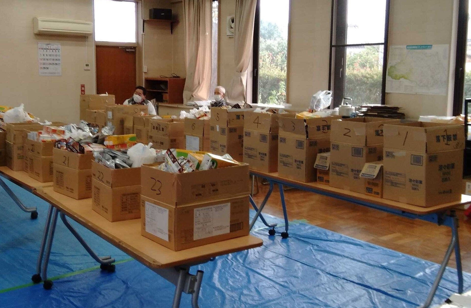 ▲支援団体での食品配布風景