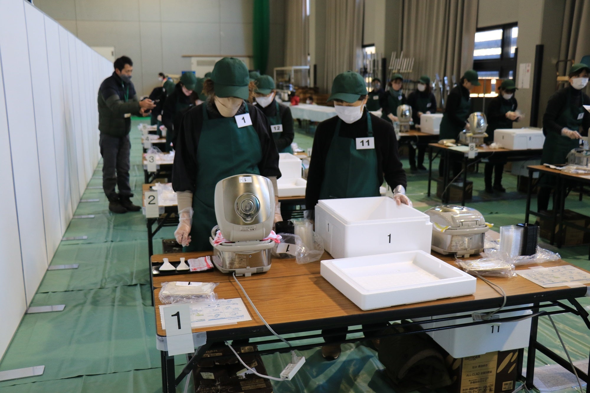 昨年開催した町プレ大会の食味審査、炊飯作業の様子