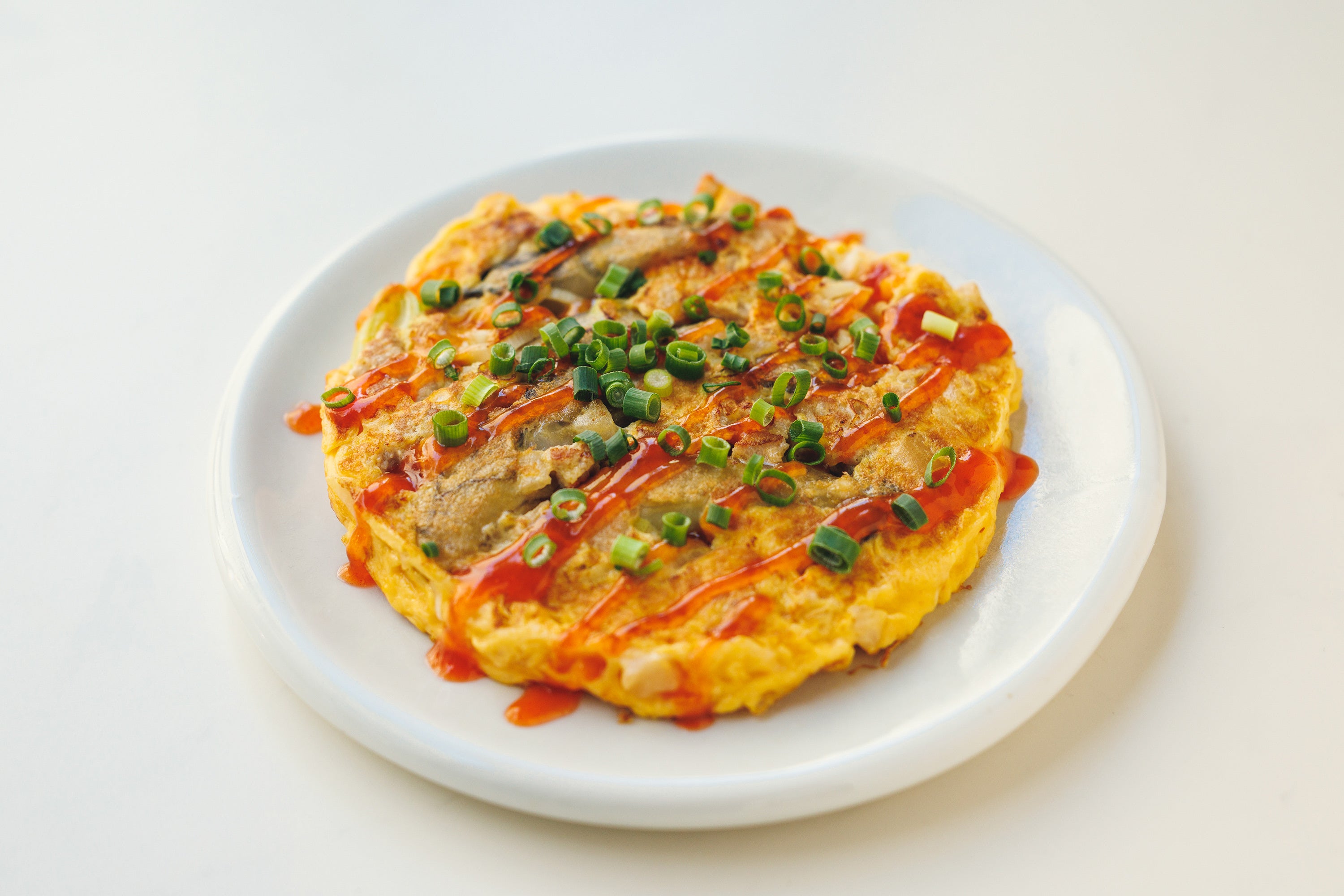 甜辣醤でいただく台湾牡蠣オムレツ