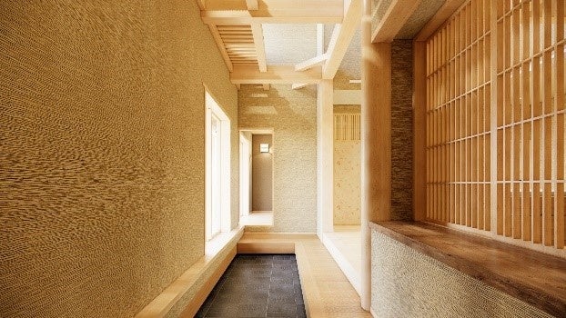 町家の通り土間を想起させる、玄関から続く土間空間