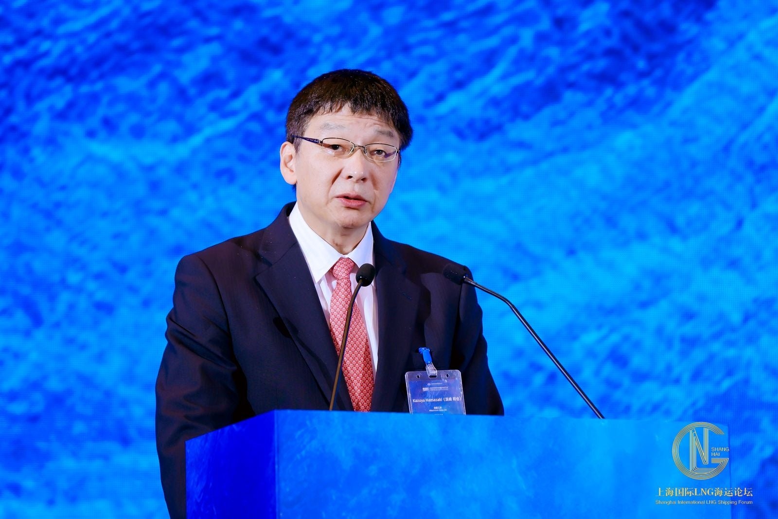 スピーチする当社濱崎常務