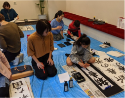 イベントイメージ： ランクアップでの「書初めイベント」の様子