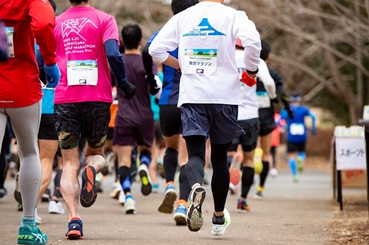 背中のゼッケンには目標大会を印字