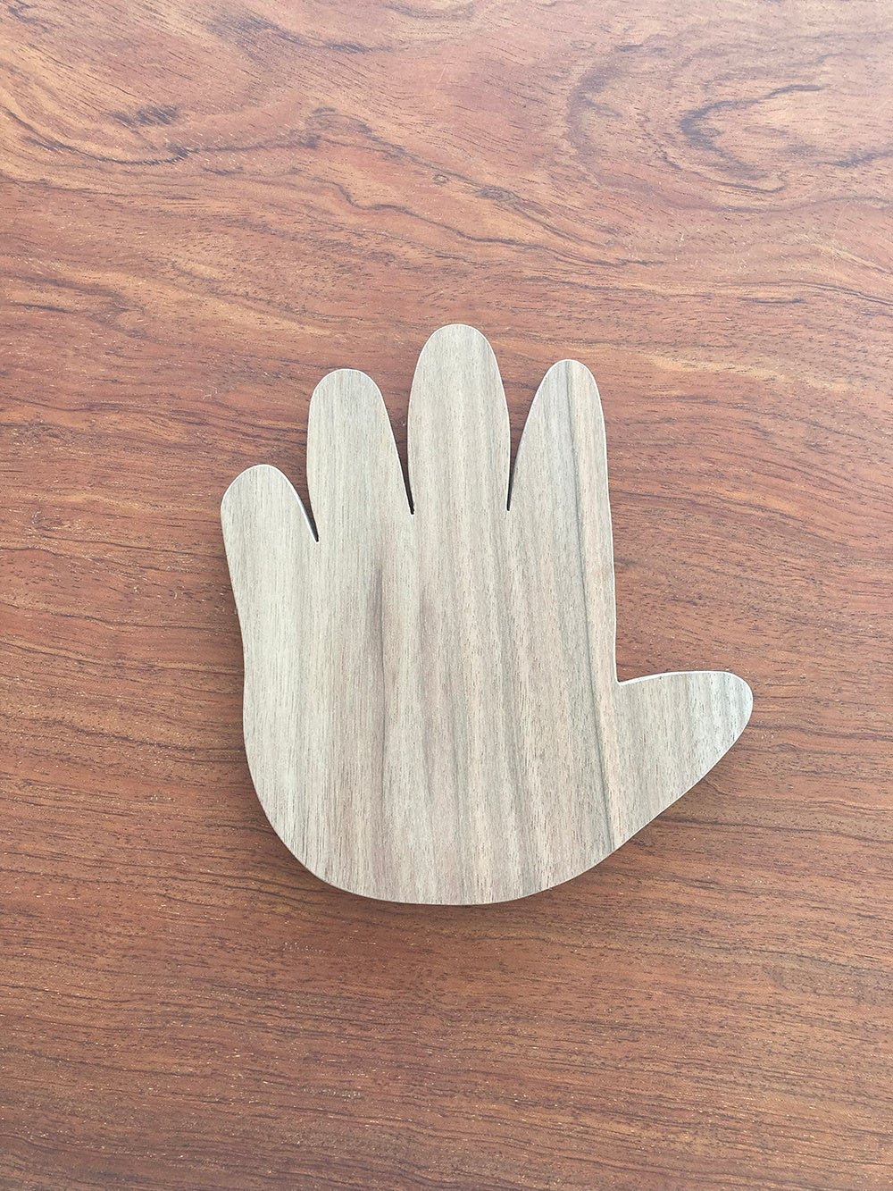 持ち手の無い手型ラケット